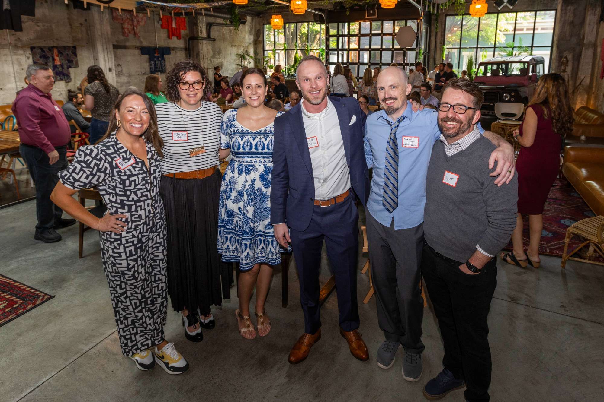 The Envision Promotions team together at a partner event